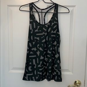 Two Nike sports vests!